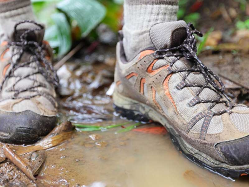 Hiking boots in the mud
