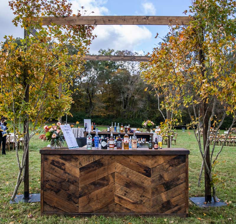 Brown bar with autumn leaves overhead at Sunday in the Park 2021