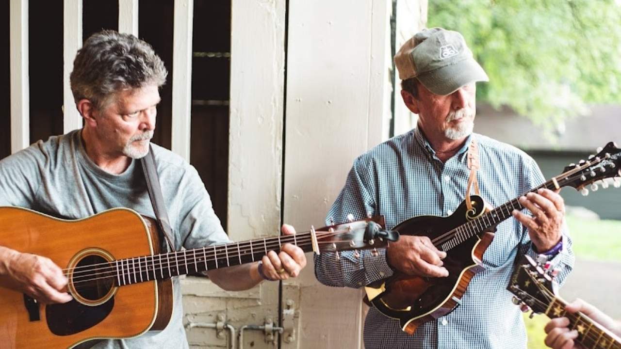 two men playing instruments