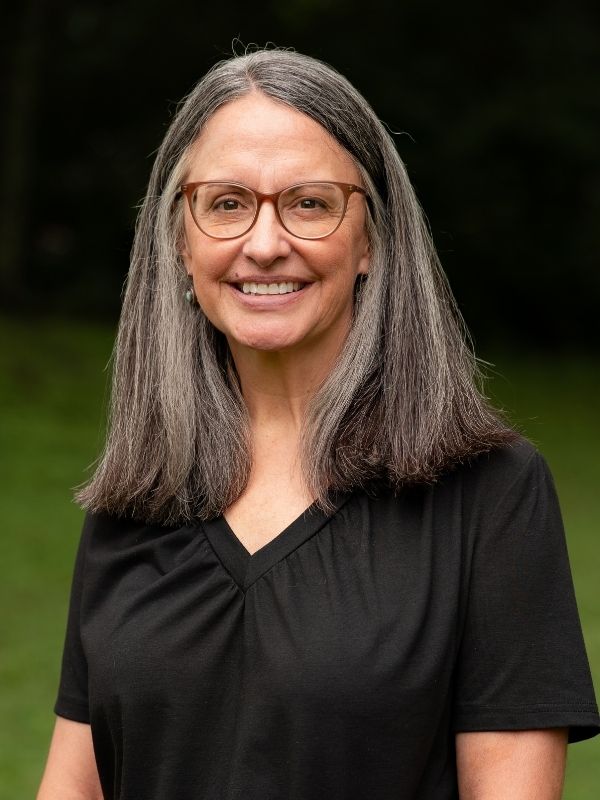 Woman smiling in field